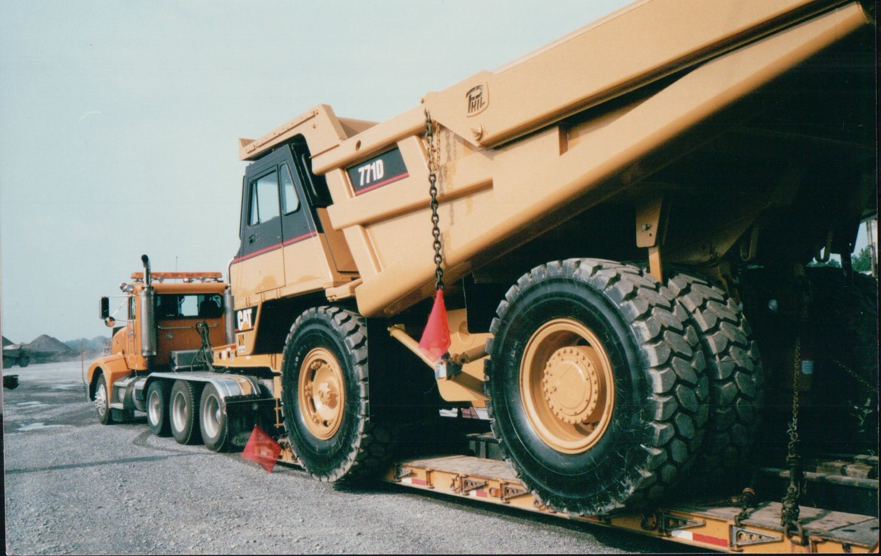 Caterpillar 771D haul truck loaded low-angle